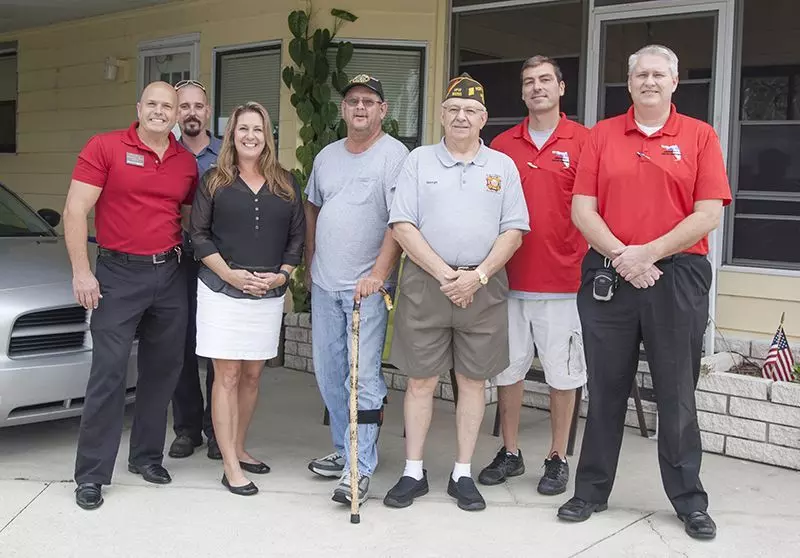 Mr. Harris Nelms, recipient of the 2016 Roofs for Heroes donation, and our business partners in the endeavor.